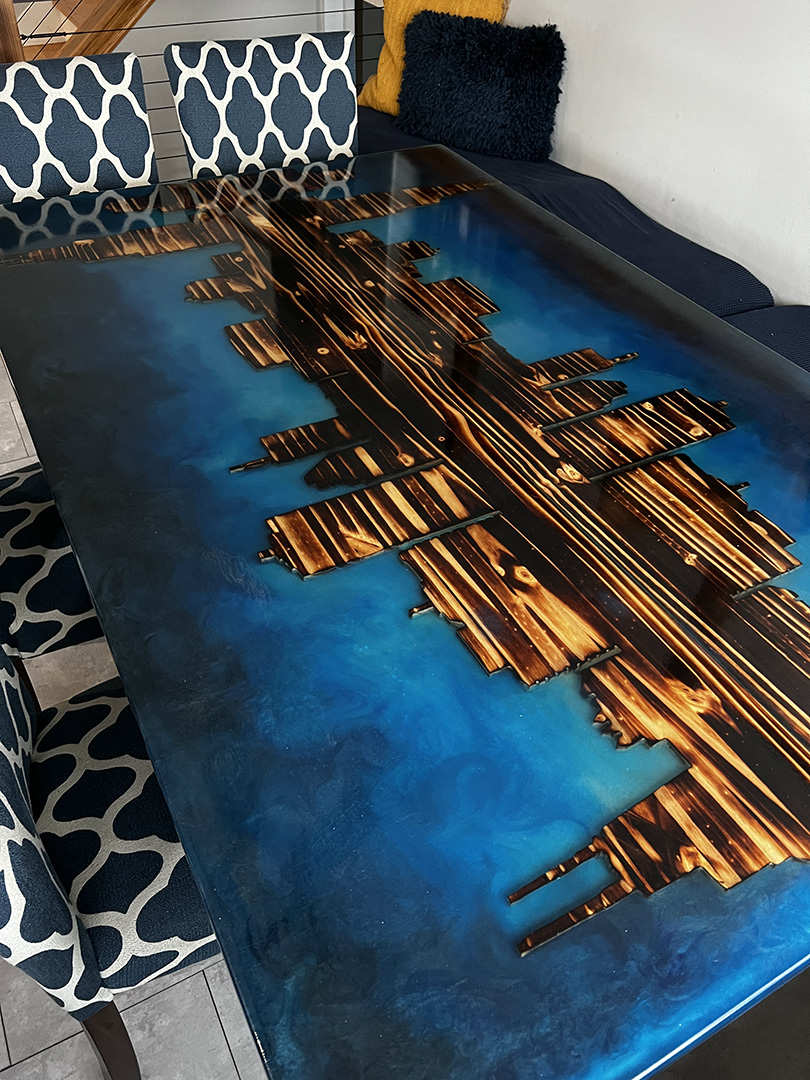 Epoxy dining table with Chicago skyline design